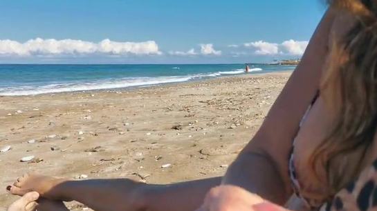 Wife Made Her Husband Cum While People Walked By On The Beach!